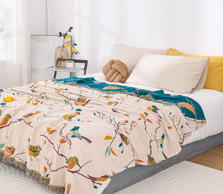 Colorful Birds On Reversible Cotton Blanket In Modern Bedroom